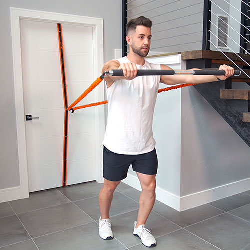 Stroops trainer James doing Standing Chest Press